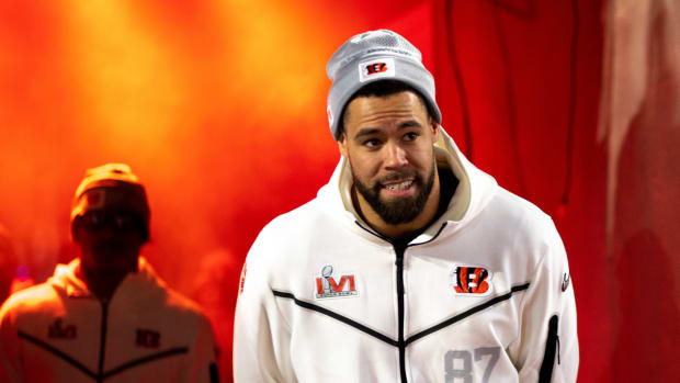 Cincinnati Bengals tight end C.J. Uzomah (87) walks onto the field during the Super Bowl LVI Opening Night Fan Rally, Monday, Feb. 7, 2022, at Paul Brown Stadium in Cincinnati. Cincinnati Bengals Fan Rally Super Bowl Lvi Feb 7 286